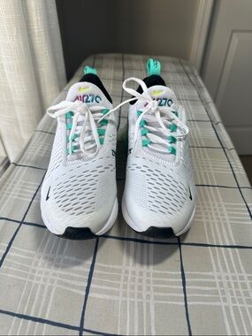 Nike Kids White Sneakers with Teal and Black Accents